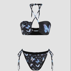 Sexy black string bikini set with vibrant blue butterfly print and halter neck design