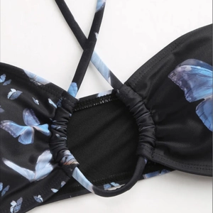 Sexy black bikini top with blue butterfly print and halter cross strap design