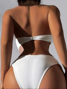 Rear view of white bandeau bikini top with metal buckle and high cut swim bottoms