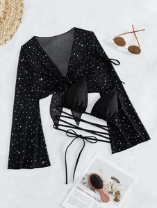 Three-piece black bikini set with high-waist ties and glittery mesh long sleeve cover-up