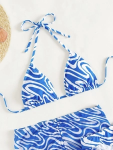 Blue marble print bikini set with halter top and ruched high-waisted bottom for beachwear