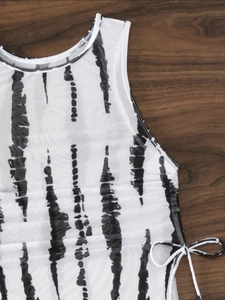 Detail of white mesh bikini cover-up with black stripes and side drawstring tie design
