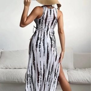 Three-piece printed mesh bikini set with high slit maxi skirt in abstract tie-dye design