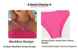 Détail du tissu côtelé rose fuchsia avec un anneau métallique en forme de cœur au col