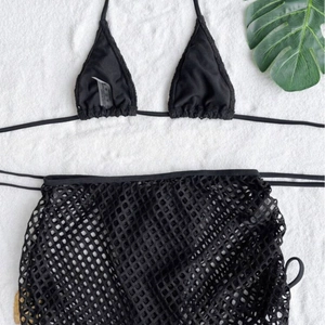 Three-piece black halter bikini set with high-waist mesh beach skirt cover-up