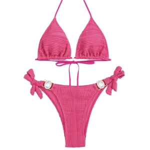 Vibrant rose red two-piece bikini set with pleated fabric and rhinestone side details