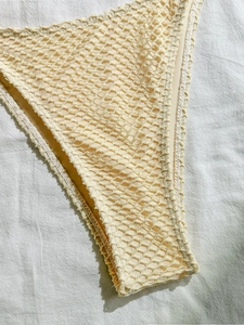 Women's beige crochet mesh halter bikini set with scallop lace trim and knit texture
