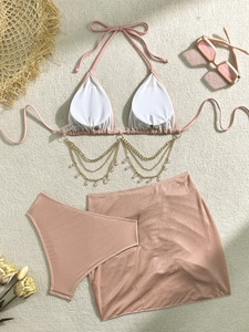Set bikini 3 pezzi rosa a vita alta con frange di catena dorata e gonna da mare