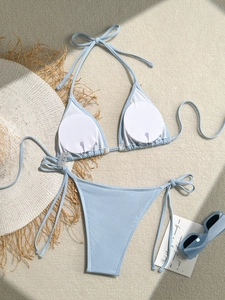 Detail of light blue ribbed bikini with removable pads and adjustable side ties