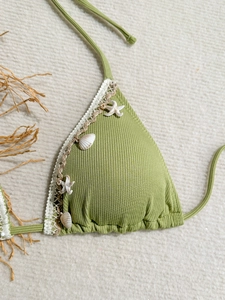 Green shell bikini top with starfish detail, lace trim and textured ribbed fabric