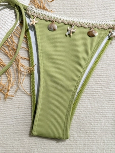 Chic olive green bikini bottom with ribbed texture and shell starfish charms