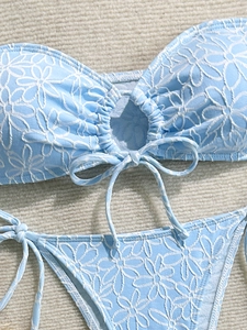 Light blue daisy embroidery bikini set with tie-knot bandeau top and side-tie bottoms