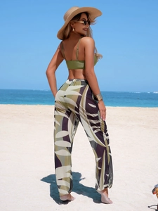 Women's olive green bikini set with tropical leaf sheer mesh beach pants for vacation