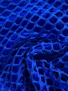 Detailed macro view of royal blue mesh fabric texture on this sexy bikini swimsuit