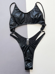 Sexy black snakeskin textured two-piece bikini set with metallic finish and high-cut bottoms