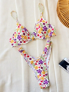 Floral print two-piece bikini set with underwire support and high cut bottoms on white base