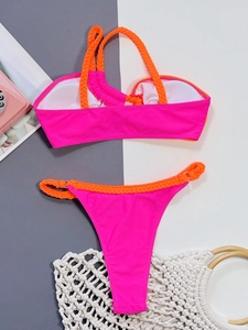 Neon pink bikini set with orange braided straps and high-cut bottoms for beachwear