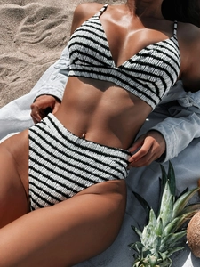 Two-piece black and white striped high waist bikini set in textured seersucker fabric