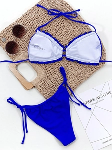 Detail of royal blue bikini lining showing washing instructions and material label