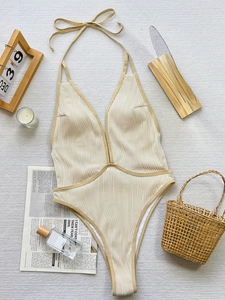 Schicker Monokini in Creme und Khaki mit Rippenmuster, Cut-Outs und Neckholder-Bindung