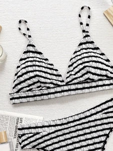 Women's black and white striped two-piece bikini set with ribbed texture fabric