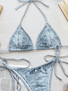 Two-piece denim print bikini set with halter top and side-tie bottoms in washed blue