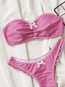 Red and white gingham bandeau bikini set with bow details and ruffled edges for women