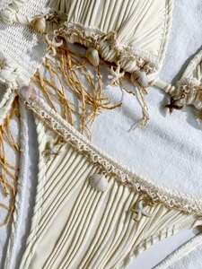 Bohemian off-white bikini set with shell charms, starfish accents and fringe details