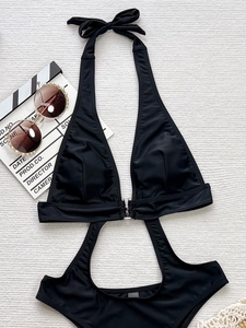 Sexy black one-piece halter monokini swimsuit with cutout design and metal ring detail