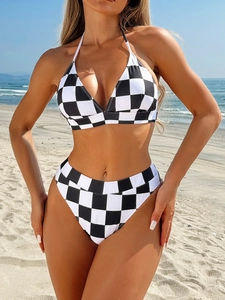 Women's classic black and white checkerboard bikini set with halter top and high waist bottom