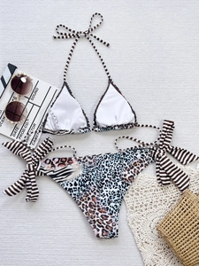 Two-piece bikini with animal print bottoms and striped neck tie set for beach vacation