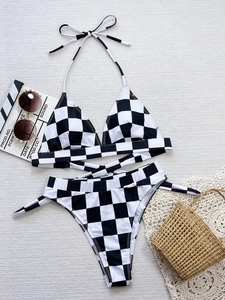 Detailed flat lay of checkered bikini with halter top and high cut tie-side bottoms