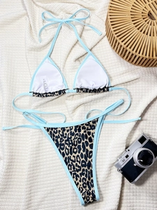 Sexy leopard print bikini set with light blue trim and adjustable tie strings