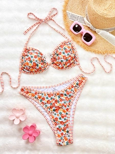 Floral print bikini set with double straps and floral metal buckles on white faux fur