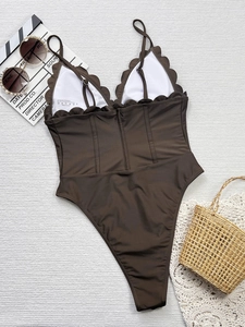 Brown deep V neck one-piece swimsuit with scalloped lace trim and side lace-up details