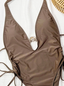 Coffee brown halter one-piece swimsuit with deep V-neck and metal U-ring detail