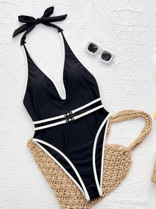 Elegant black one-piece swimsuit with white waist stripes and stylish halter neck bow
