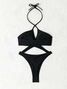 Detailed view of black one-piece swimsuit with criss-cross hollow cut-outs and halter neck