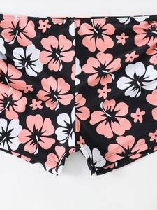 Short de bain noir à plat avec imprimé floral hibiscus rose et taille élastique confortable