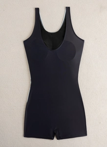 Detailed flat lay of black one-piece athletic swimwear with boy-leg cut and padded cups