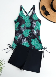 Platte weergave van bloemen tankini-top met trekkoorden en zwarte zwembroek voor dames