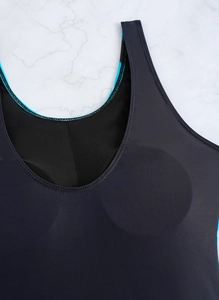 Close-up of black one-piece swimsuit featuring blue stitched edges and built-in pads
