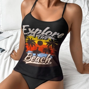 Two-piece black tankini swimsuit featuring sunset beach print and sheer mesh hem detail
