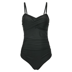 Detail view of black one-piece swimsuit featuring cross pleats and tummy control design