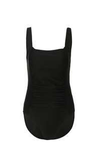 Detail view of black one-piece swimsuit featuring square neck and ruched slimming belly panel