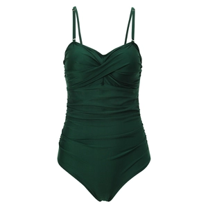 Detail of dark green one-piece swimsuit featuring a twist knot neckline and ruched tummy control