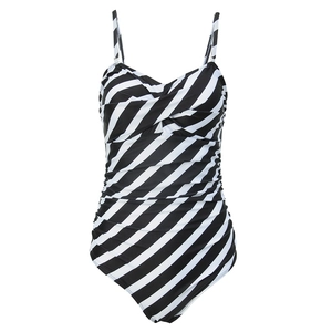 Detail of one-piece swimsuit with diagonal stripes and front twist knot design