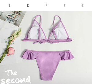 Flat lay of lavender bikini set with ruffled details and removable chest pads