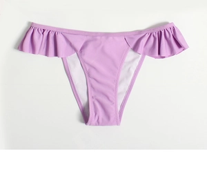 Detail of light purple bikini bottoms with ruffled waist and smooth elastic fabric