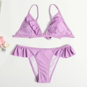 Light purple two-piece bikini set featuring ruffled triangle top and low-waisted bottoms
